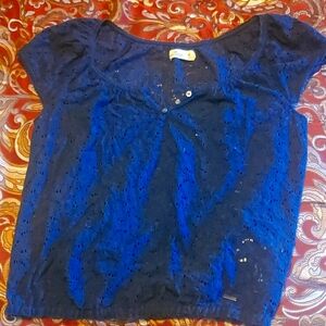 Holister blue eyelet cap sleeve blouse with gathered bottom. M